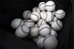pile of baseballs